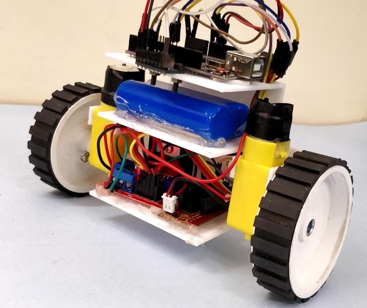 Two-wheeled robot with a servo-mounted ultrasonic sensor